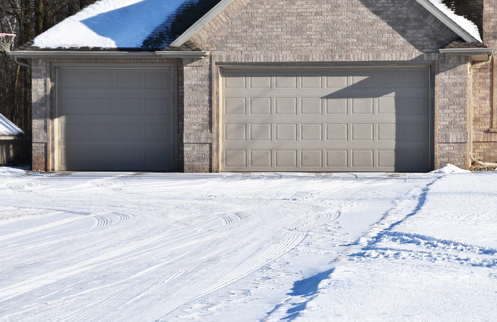 Seasonal Garage Door Maintenance: Preparing for Winter and Summer blog image